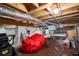 Basement with exposed ductwork and vapor barrier featuring some stored items at 3220 Millwood Se Trl, Smyrna, GA 30080