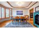 Bright dining room with hardwood floors, custom molding and bright natural lighting at 3220 Millwood Se Trl, Smyrna, GA 30080