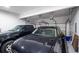 Spacious garage featuring high ceilings, storage solutions, and room for two cars at 3220 Millwood Se Trl, Smyrna, GA 30080