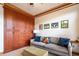Comfortable living room with a built-in cabinet, a soft sofa and neutral carpeting at 3220 Millwood Se Trl, Smyrna, GA 30080