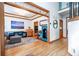 Open-concept living space features hardwood floors, ample seating, and decorative woodwork at 3220 Millwood Se Trl, Smyrna, GA 30080