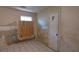 This bedroom is in need of repair and has a board over the wall at 45 James P Brawley Nw Dr, Atlanta, GA 30314