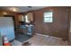 A room featuring laminate counters, stained tile floors and upper cabinets at 45 James P Brawley Nw Dr, Atlanta, GA 30314