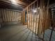 Spacious unfinished basement with exposed studs and beams for renovation options at 4911 Hairston Pl, Stone Mountain, GA 30088