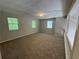 Bonus room area with natural light and neutral carpet flooring at 4911 Hairston Pl, Stone Mountain, GA 30088