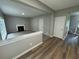 Spacious living room features a fireplace and neutral color palette at 675 Stonebridge Loop, Lithonia, GA 30058