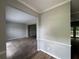 Spacious living room featuring fresh paint, new carpet and bright lighting at 675 Stonebridge Loop, Lithonia, GA 30058