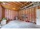 Unfinished basement with exposed utilities and ample storage space at 100 Ashley Hall Ct, Woodstock, GA 30188