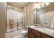 Bathroom featuring a vanity, shower with glass doors, toilet, and tiled floor at 100 Ashley Hall Ct, Woodstock, GA 30188