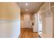 Welcoming entryway with built-in storage, hardwood floors, and ample natural light, providing a functional and stylish transition at 100 Ashley Hall Ct, Woodstock, GA 30188