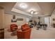 This exercise room is complete with exercise equipment and comfortable seating at 100 Ashley Hall Ct, Woodstock, GA 30188