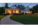 Inviting home with manicured lawn and a charming entryway, showcasing a perfect blend of brick and siding at 100 Ashley Hall Ct, Woodstock, GA 30188