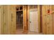 Unfinished basement with door and wood frame construction ready to be customized at 10765 Shallowford Rd, Roswell, GA 30075
