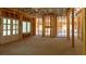 Unfinished basement with french doors and wood frame construction ready to be customized at 10765 Shallowford Rd, Roswell, GA 30075