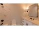 Bright bathroom featuring a white vanity, granite countertop, and walk-in shower with beautiful marble-style tiling at 10765 Shallowford Rd, Roswell, GA 30075