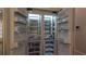 Spacious built-in refrigerator with glass shelves and ample storage space for organization at 10765 Shallowford Rd, Roswell, GA 30075