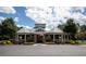 Community clubhouse with manicured landscaping offers residents a place to gather at 1120 Bentwater Dr, Acworth, GA 30101