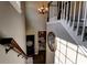Welcoming foyer with hardwood floors, a chandelier, and a view of the dining area at 1120 Bentwater Dr, Acworth, GA 30101