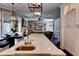 Open-concept kitchen with long center island and breakfast nook seamlessly flows into the living area at 1120 Bentwater Dr, Acworth, GA 30101