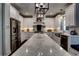 Spacious kitchen features white cabinets, stainless steel appliances, and a large center island at 1120 Bentwater Dr, Acworth, GA 30101
