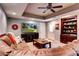 Relaxing living room with a ceiling fan, recessed lighting, and an entertainment center at 1120 Bentwater Dr, Acworth, GA 30101