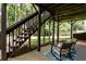 Under-deck patio offers additional outdoor living space for relaxation and entertaining at 1120 Bentwater Dr, Acworth, GA 30101