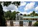 Splashpad and Community Pool with lounge chairs and shade for relaxing poolside at 1120 Bentwater Dr, Acworth, GA 30101