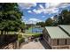 Upper view of tennis courts, along with an outdoor cabana at 1120 Bentwater Dr, Acworth, GA 30101