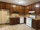Functional kitchen equipped with ample cabinet space, modern appliances, and neutral countertops at 1253 Todiway Ct, Jonesboro, GA 30238