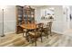 Charming dining room area adjacent to kitchen with hardwood floors and ample space at 4216 Stillwater Dr, Duluth, GA 30096