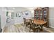 Inviting dining room boasts hardwood floors, an elegant table with seating, and a built-in china cabinet at 4216 Stillwater Dr, Duluth, GA 30096