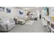 Spacious living room with a large comfortable sectional couch, soft rug, and modern decor at 4216 Stillwater Dr, Duluth, GA 30096