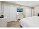 This bedroom features wood floors and large closets at 4216 Stillwater Dr, Duluth, GA 30096