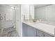 Stylish bathroom with modern vanity, subway tile, and patterned floor tiles at 4252 River Green Dr # 501, Atlanta, GA 30327