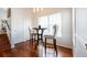 Bright breakfast nook features hardwood floors, a table with two stools and natural light at 4252 River Green Dr # 501, Atlanta, GA 30327