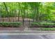 Gated community entrance with paved stone pathway at 4252 River Green Dr # 501, Atlanta, GA 30327