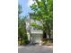 Charming two-story home with a one-car garage nestled amongst lush trees at 4252 River Green Dr # 501, Atlanta, GA 30327