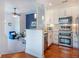Open kitchen and living room features stainless steel appliances and a breakfast bar at 4252 River Green Dr # 501, Atlanta, GA 30327