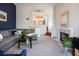 Comfortable living room that offers a fireplace, lots of light, and an adjacent kitchen at 4252 River Green Dr # 501, Atlanta, GA 30327