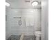 Clean shower stall with white subway tiles, glass door and patterned flooring at 4252 River Green Dr # 501, Atlanta, GA 30327
