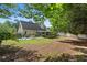Large backyard offers ample space for outdoor recreation, entertaining, and gardening at 710 Crab Orchard Ct, Roswell, GA 30076