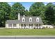 Charming single-Gathering home with a manicured lawn and beautiful landscaping, exuding curb appeal at 710 Crab Orchard Ct, Roswell, GA 30076