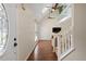 Bright entryway foyer with a view of the living room and stairs at 710 Crab Orchard Ct, Roswell, GA 30076