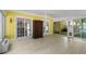 Bright sunroom featuring tile floors and multiple windows at 710 Crab Orchard Ct, Roswell, GA 30076