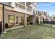 View of backyard with patios, fenced yard, and outdoor seating, ideal for relaxation and gatherings at 1070 Harper Dr, Alpharetta, GA 30076