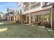 Expansive backyard featuring multiple patios, a fenced yard, and outdoor furniture for stylish outdoor living at 1070 Harper Dr, Alpharetta, GA 30076