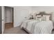 Comfortable bedroom featuring a decorative headboard and plenty of natural light at 1070 Harper Dr, Alpharetta, GA 30076