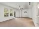Spacious bedroom with plenty of natural light and access to the balcony at 1070 Harper Dr, Alpharetta, GA 30076