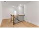 Hallway on the second floor with natural hardwood floors at 1070 Harper Dr, Alpharetta, GA 30076