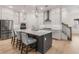 Gourmet kitchen with center island and breakfast bar with stainless steel appliances at 1070 Harper Dr, Alpharetta, GA 30076